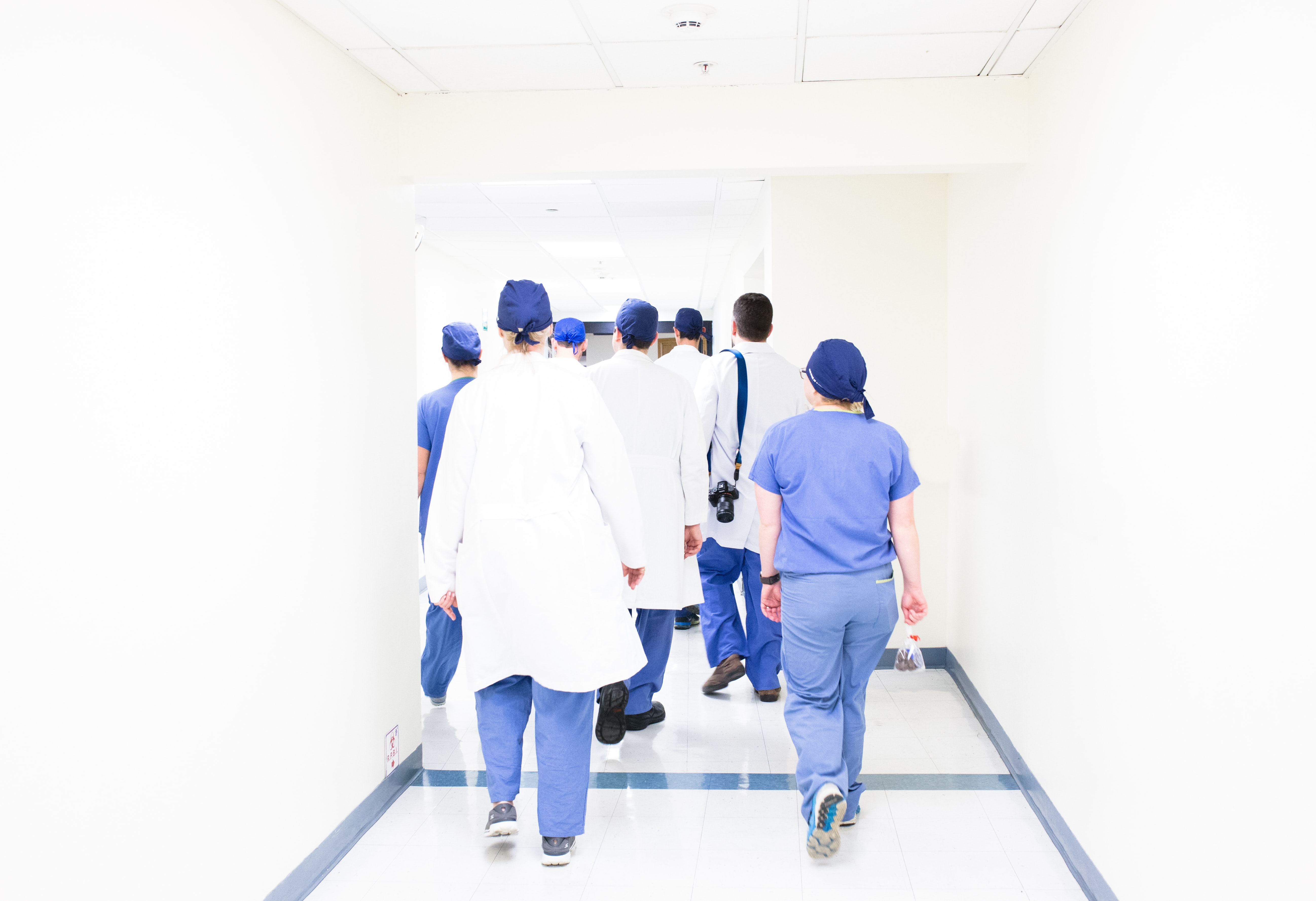 Healthcare workers walking